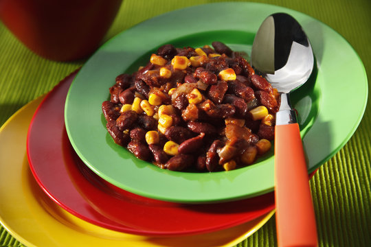 Vegetarian Chili Con Carne On Colorful Plates