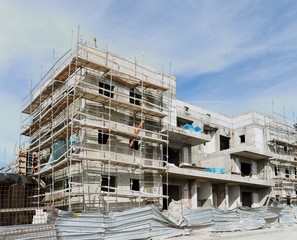 Three-storeyed apartment building under construction