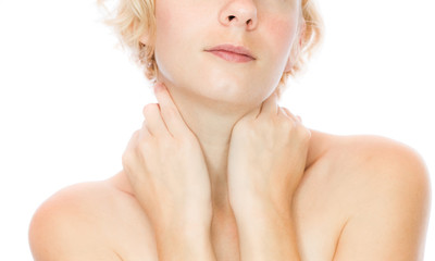 Crop image of calm girl holding her neck