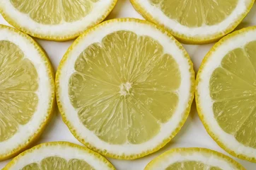  Voedselachtergrond - Gesneden citroen © dmitrydesigner