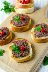 Crostini with liver pate and berries