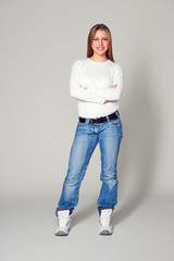 smiley young woman with folded hands