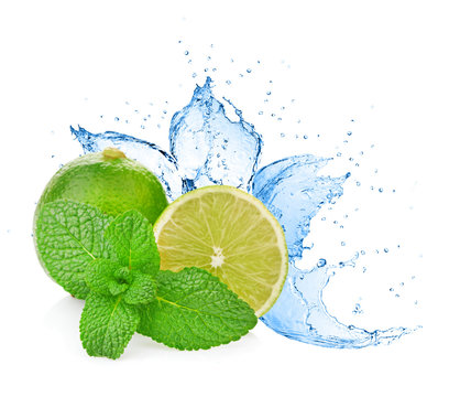 Water splash on lime with mint isolated on white