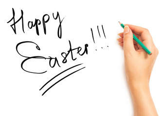 Woman's hand holding a pencil and writing Happy Easter