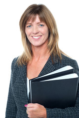 Corporate executive holding important documents