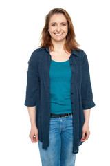 Obraz premium Smiling middle aged woman wearing blue cardigan
