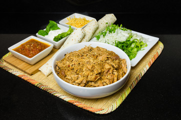 Ingredients to make pulled chicken tacos