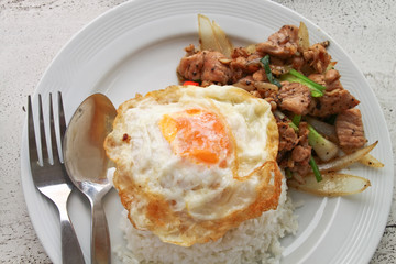 a fried egg on rice.
