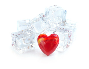 Red heart on ice cubes background