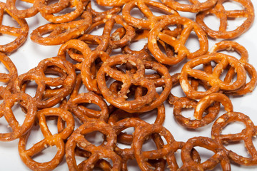 salted pretzels on white background