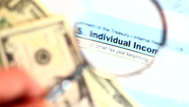 Financial concept. 1040 document.