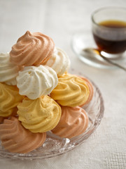 Colored meringues with coffee
