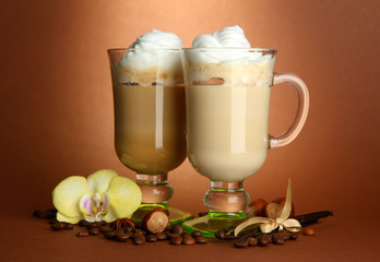 Fragrant coffee latte in glasses cups with spices,