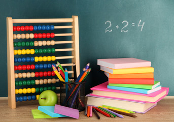 Toy abacus, books and pencils