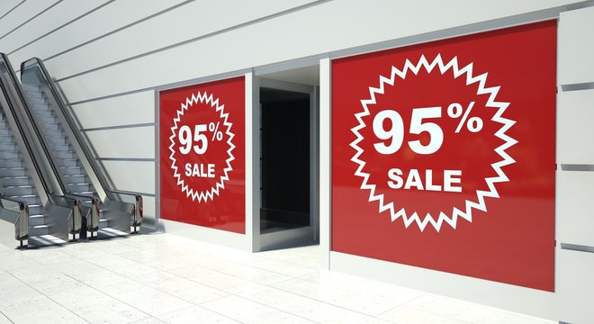 95 percent sale on shopfront windows and escalator
