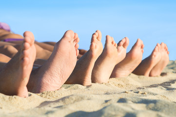 Feet relax at beach