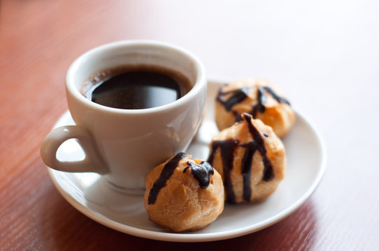 Eclairs with coffee