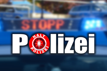 Polizeikelle mit Blaulicht