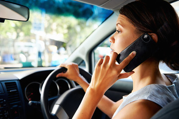 driving phone woman