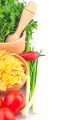 Pasta in bowl and vegetable