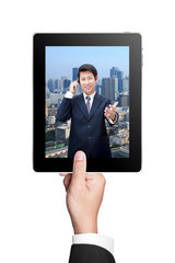 Business Man's hands holding a tablet