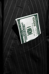Dollar dans une poche de veste