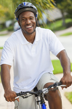 African American Man Riding Bicycle