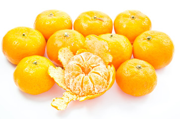small orange in bowl isolated on white background
