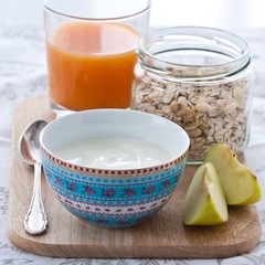 Breakfast with yoghurt, muesli and juice