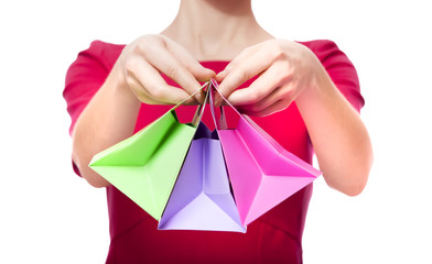 Women in red dress with little shopping bags