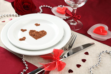 Table setting in honor of Valentine's Day close-up