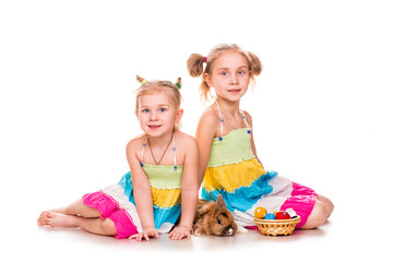 Two happy kids with easter bunny and eggs. Happy Easter