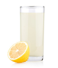 Glass of lemon juice with lemon half