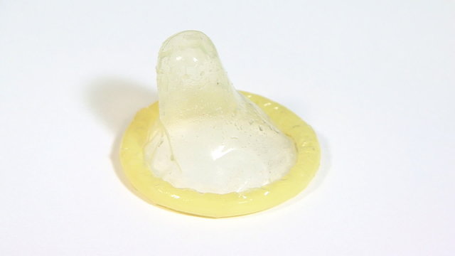 Rolled latex condom