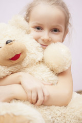 little girl and teddy-bear