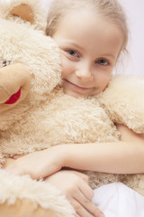 natural close up portrait of little blond girl