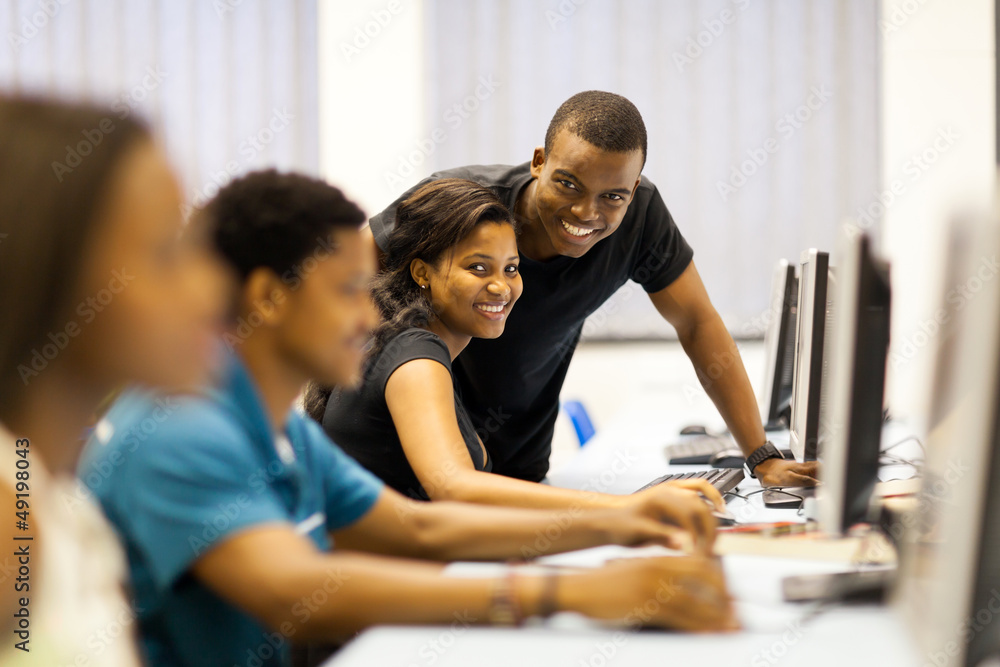 Wall mural group of african american college students in computer room