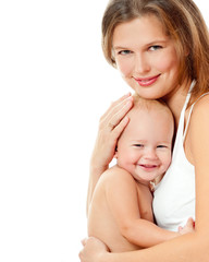 Young mother hugging baby