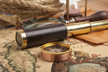 Brass telescope on map