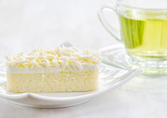 Cup of herbal tea and fresh cake