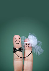 bride and groom fingers