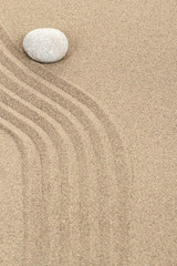 zen stone in sand