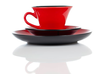 Red cup of tea on a white background