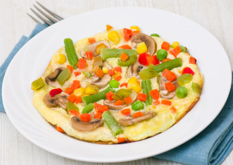 omelet with vegetables and mushrooms