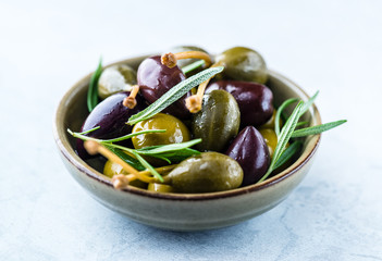 Marinated olives and capers with rosemary