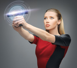 futuristic woman with gadget