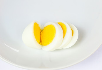 boiled egg sliced on plate