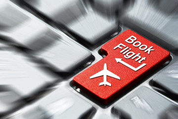 Book flight button on the computer keyboard