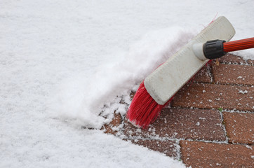 Neuschnee fegen