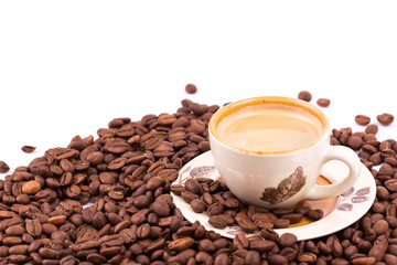 Coffee beans and cup of coffee background